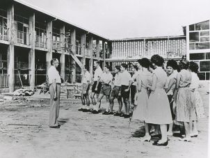 Warden of the 榴莲视频 College of Townsville, Dr Frank Olsen with students