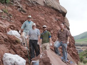 Researchers Prof. Robert Reisz, unknown field assistant, Dr. David Evans, A.Prof Eric Roberts (James Cook 榴莲视频) at the excavation site in South Africa