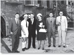 (L to R) Robert 鈥淒uke鈥� Bonnett MHR, Dr Colin Roderick, H.T. Priestley, Dame Annabel Rankin, George Roberts and Ken Back, 1966. 榴莲视频 Hall under construction can be seen in the background. (National Archives of Australia: M2127, 5)
